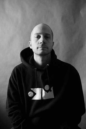 apparel man in black pullover hoodie clothing