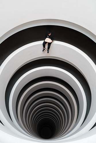 human man sitting on deep pit design person