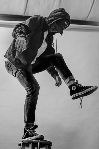 human man standing on stool person