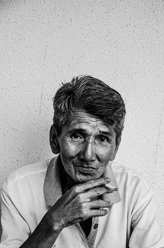 human man touching his chin portrait