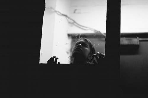 human person behind door person