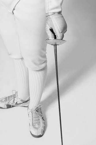 clothing person holding fencing sword apparel