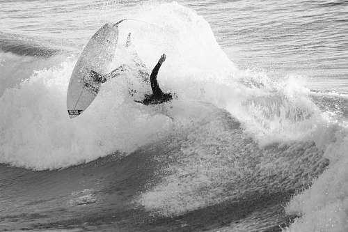 nature person surfing during dayttime ocean