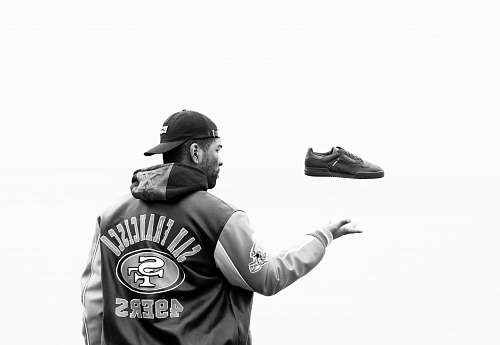 human person throwing his shoe people