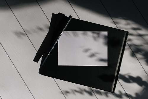 building photo of a paper and pen triangle