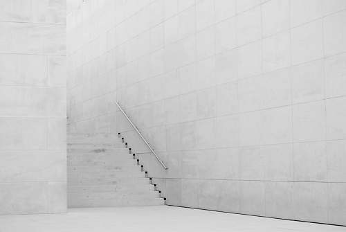grey photography of white concrete stairs architecture