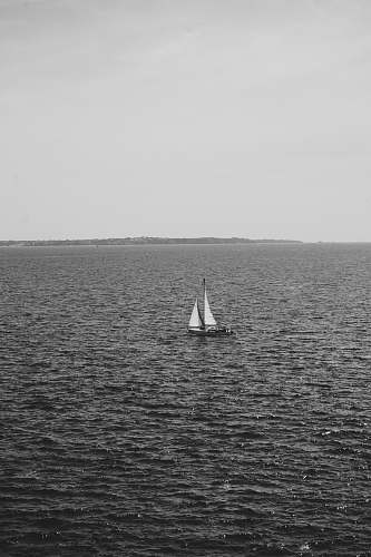 grey sailboat in sea transportation
