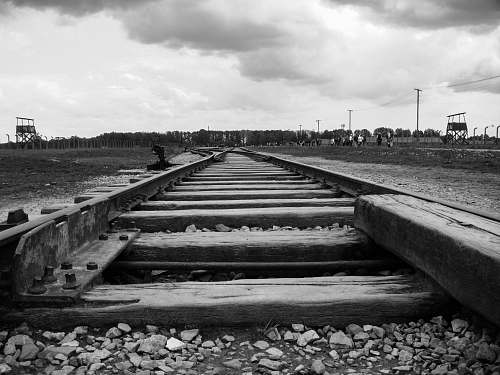rail selective focus photography of train rail railway