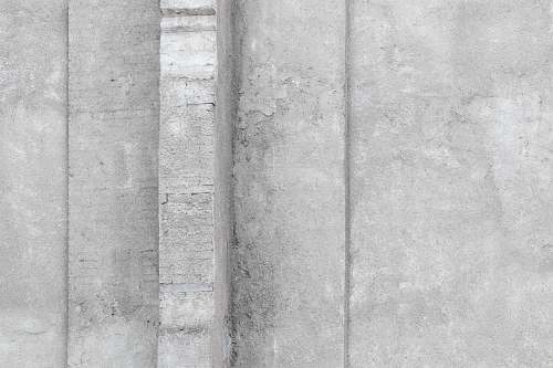 grey top view photo of gray concrete road curb wall
