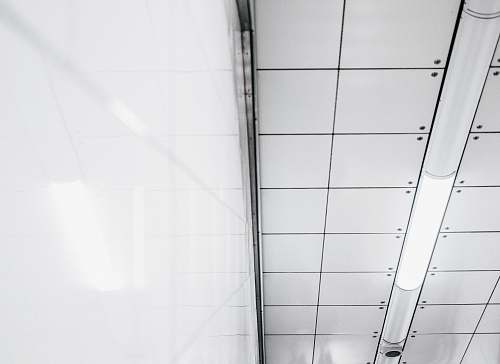 grey turned on fluorescent light ceiling