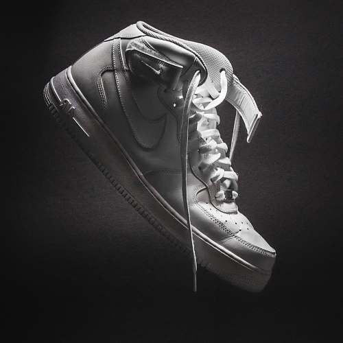 clothing unpaired white Nike low-top shoe apparel