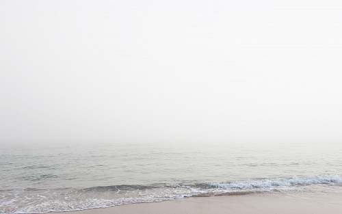 sea waves rushed to shore at daytime ocean