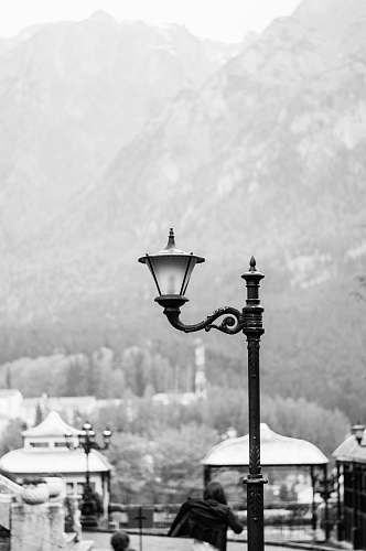 human white and black post lamp close-up photography person