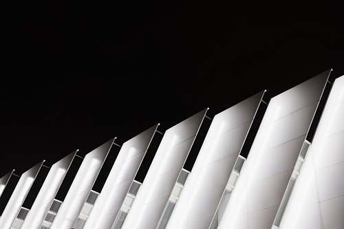 architecture white and black wooden panel building