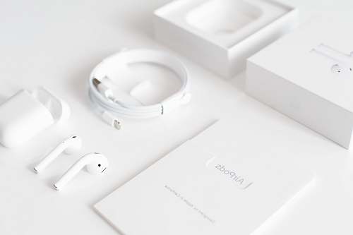 white white earpods electronics
