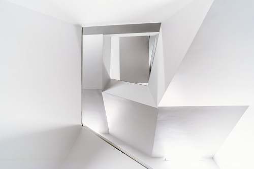 grey white wall mirror corridor