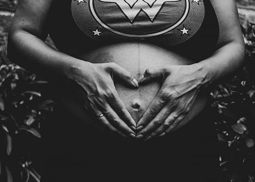 grey woman holding tummy skin