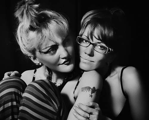skin woman hugging woman accessories