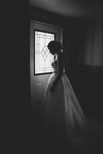 person woman standing behind the door human