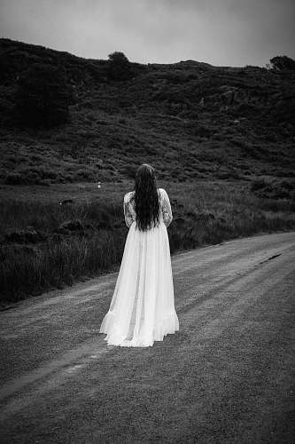 apparel woman standing om foild clothing