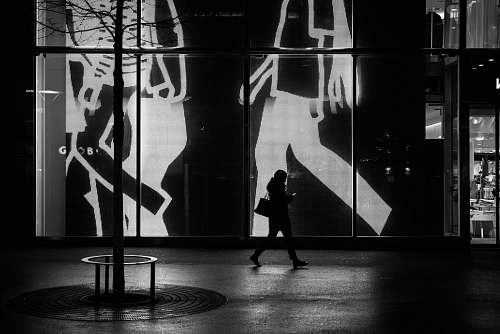 indoors woman walking near the gate interior design