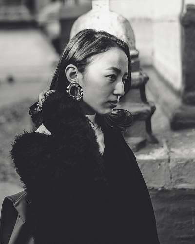 human women's black long-sleeved coat person