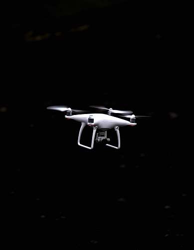 drone white and black quadcopter drone white