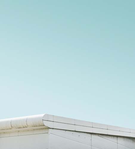 slough architectural photography of white steel roof structure sky