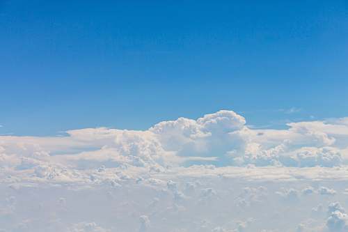 sky bird's eye view photo of sea of white clouds cloud