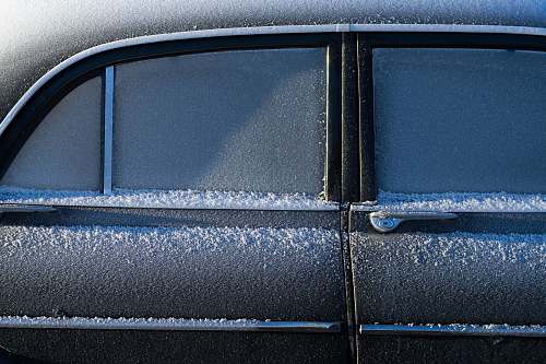frost gray vehicle covered by snow car