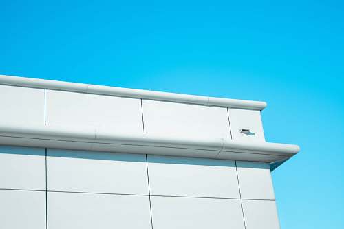 building white concrete building during daytime minimalism