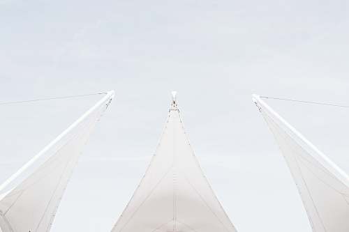 building worm's eye view photography of building sail