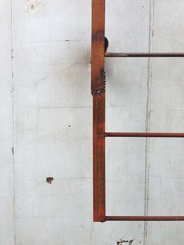 stair brown metal ladder on wall ladder