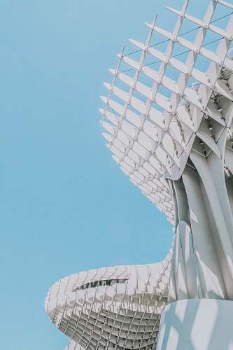sevilla architectural photography of white building under blue skies spain