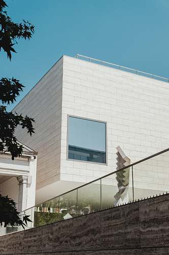 leuven closed-window white concrete house at daytime belgium