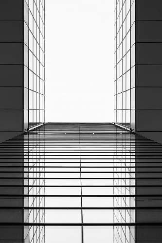architecture gray and black building mirror black-and-white