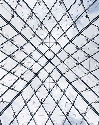 architecture low-angle photo of gray metal frame paris