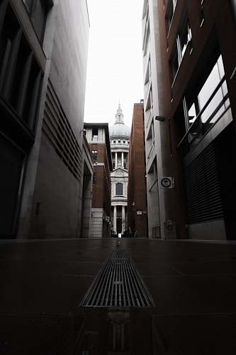 alley low-angle photography of buildings street