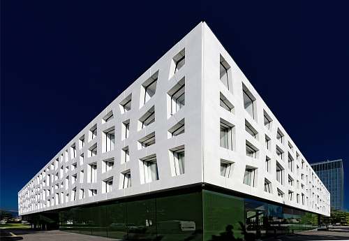 risch-rotkreuz low-angle photography of white and green painted building switzerland