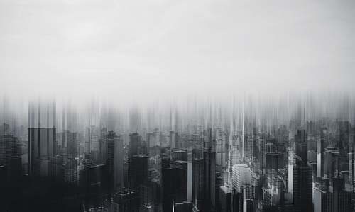 grey time lapse photography of city building city