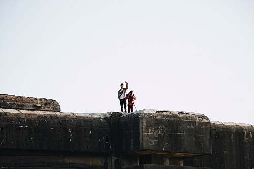 human unknown persons standing outdoors bunker