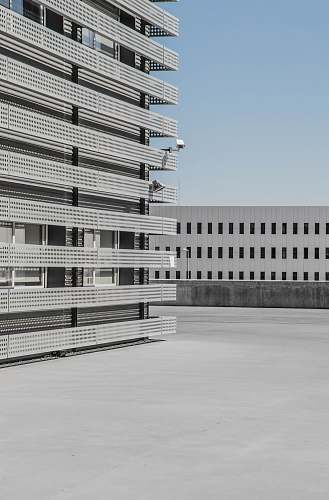 architecture white and gray high-rise building under blue sky at daytime architectural