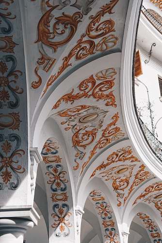 architecture white and orange floral ceiling arch