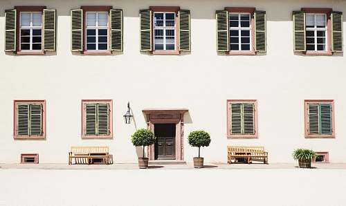 window white building with nine windows windows