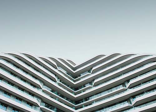 grey worm's eye view of white building housing