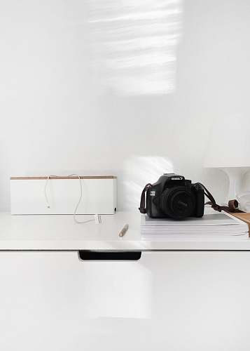 electronics Canon DSLR camera on table interior