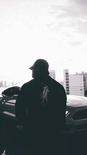 automobile grayscale photo of person wearing US Polo jacket transportation