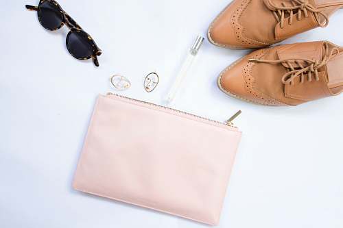 shoe oxford shoes, sunglasses, and wristlet accessories
