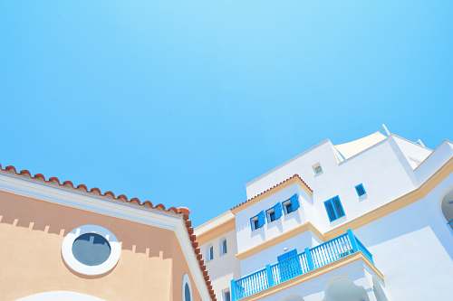 building white and orange building blue