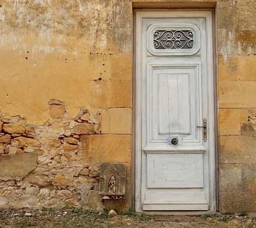 wall closed white wooden door architecture